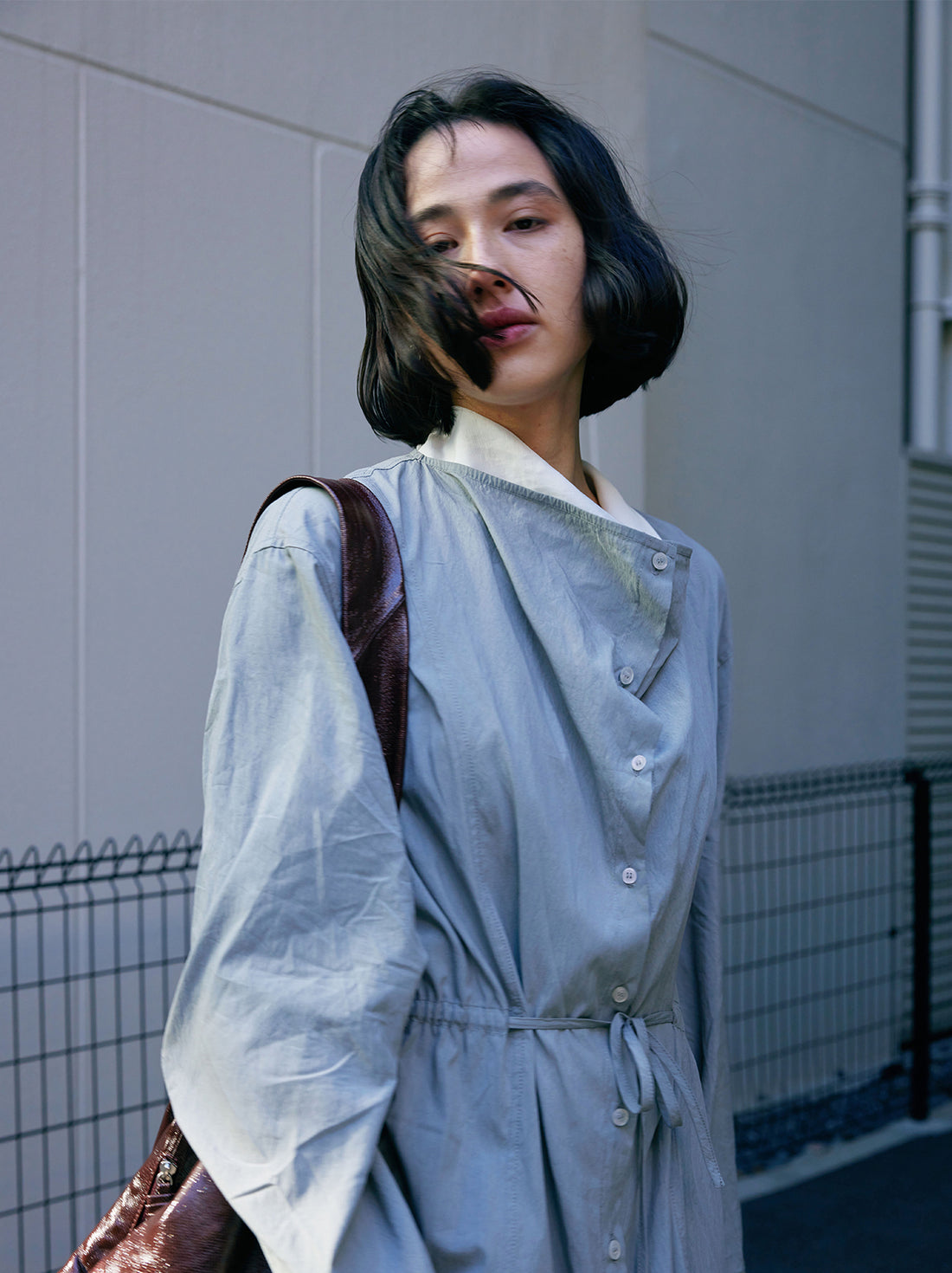 Heavy-duty draped neckline tie-waist full-length trench coat